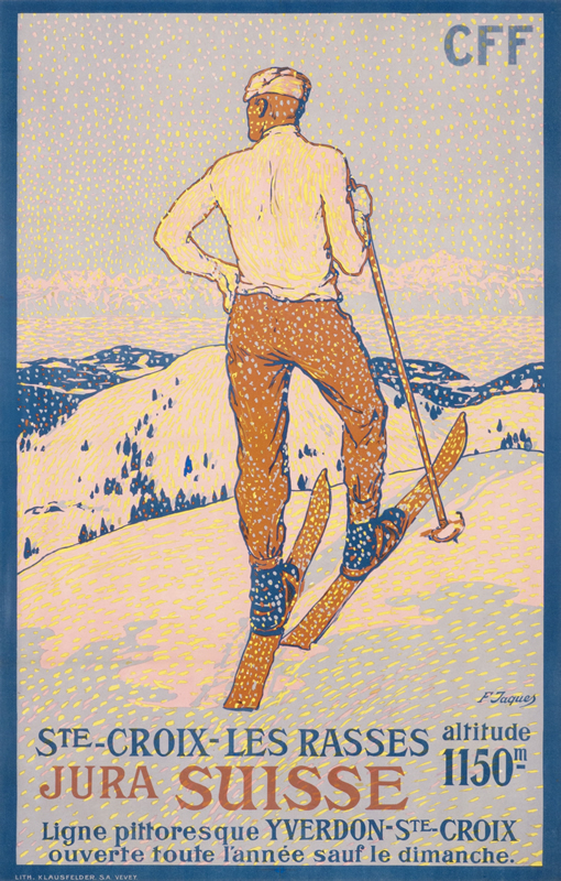 Rear view of man on skis taking rest on mountains; blue, white, yellow