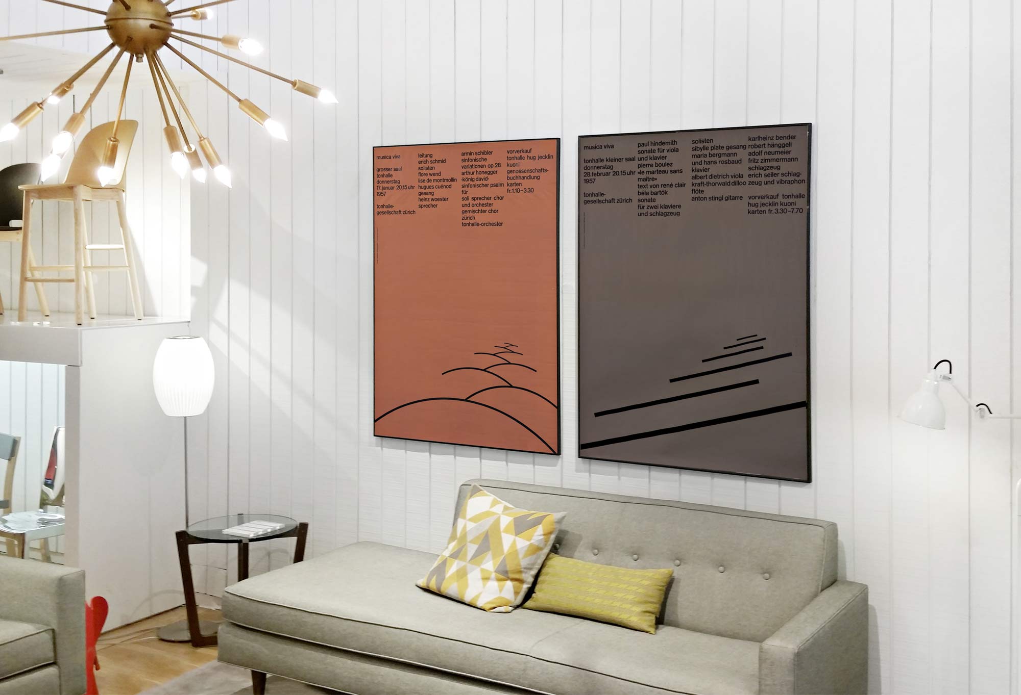 Typographic music posters in playful modern living space; brown, grey, yellow, white