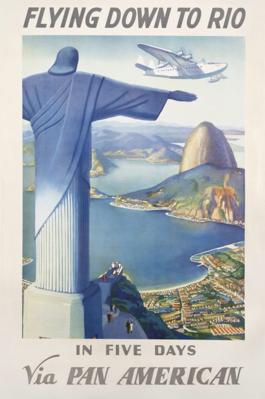 Clipper flies over bay of Rio, Sugarloaf and the statue atop Corcovado; blue, red, green